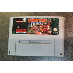 SNES konsoli Donkey Kong Country teemapakkauksessa (takuu 6kk)