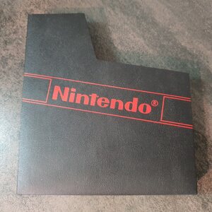 NES pölysuoja - Nintendo logolla