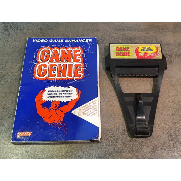 NES Game Genie + ohjekirja